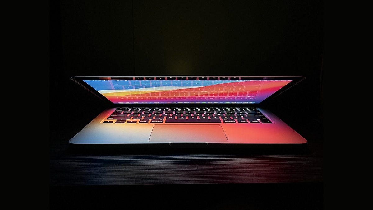 Macbook on Black Background - Apple Repair Los Angeles